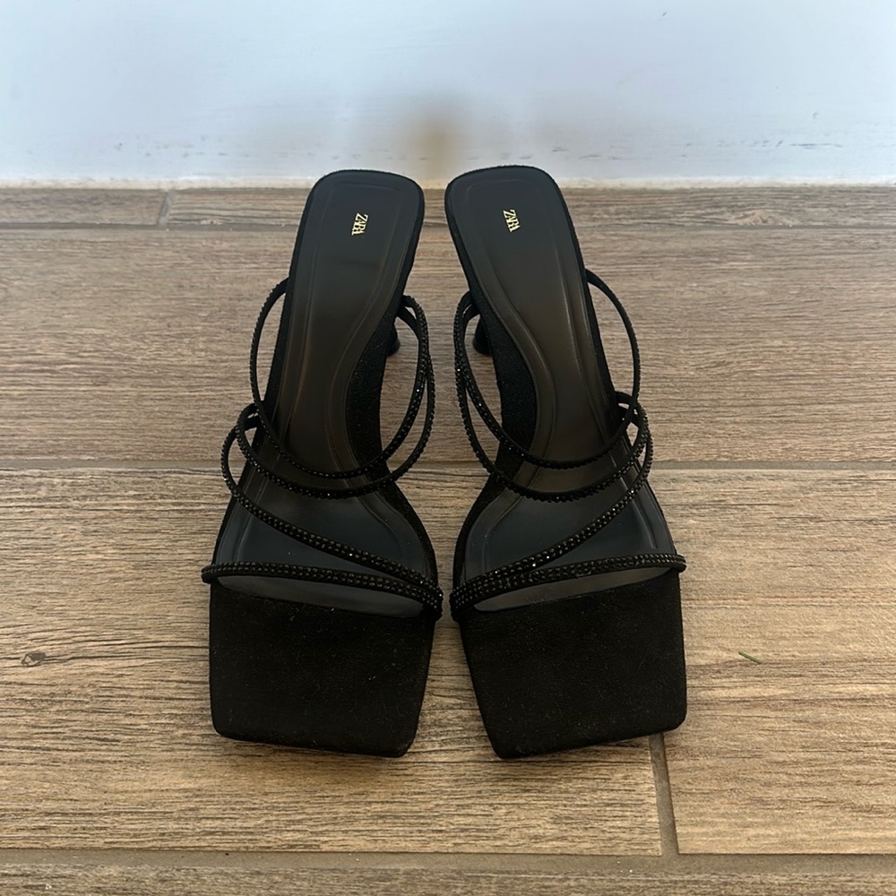 Zara women’s black heel with rhinestone straps.

Size: women’s 10 / 42